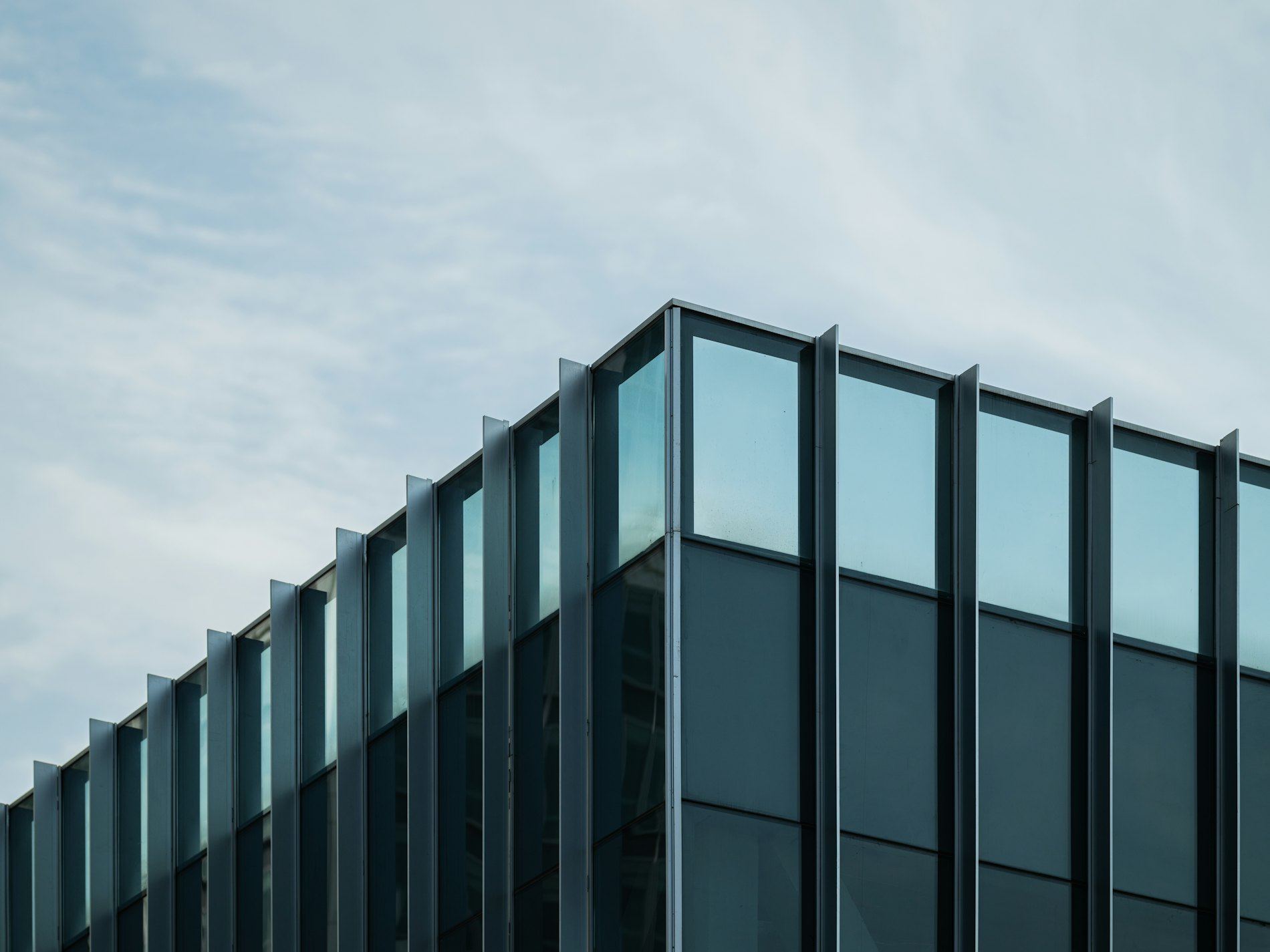 a tall building with lots of windows on top of it