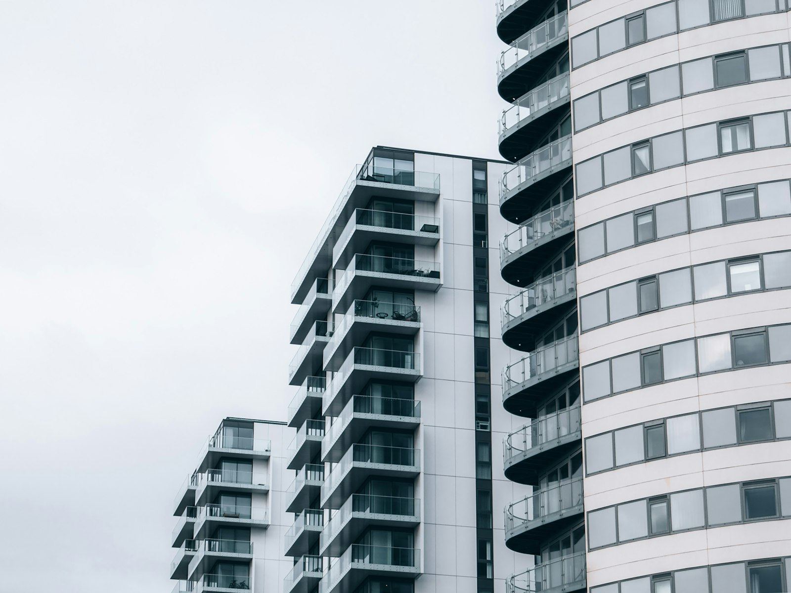 a couple of tall buildings next to each other